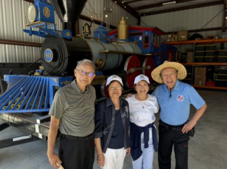 Group photo in front of the Jupiter train model. Group photo in front of the Jupiter train model.